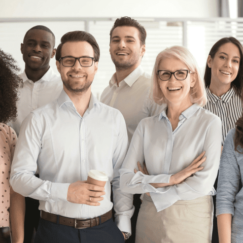 workers taking a group photo at work1